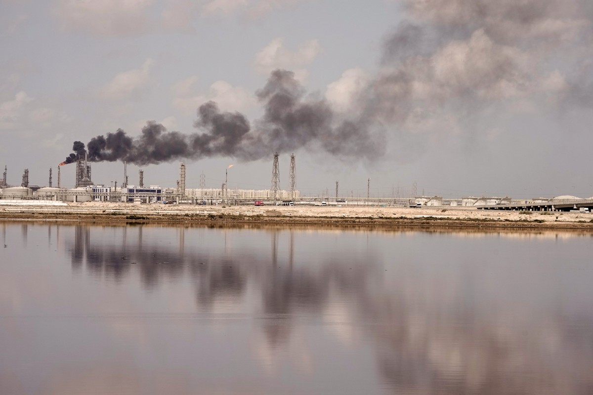 Smoke raises from an oil refinery in the Mediterranean harbor of the Delta port city of Alexandria, Egypt, Thursday, Aug. 22, 2024. The Egyptian government has been grappling with a deep economic cris ...