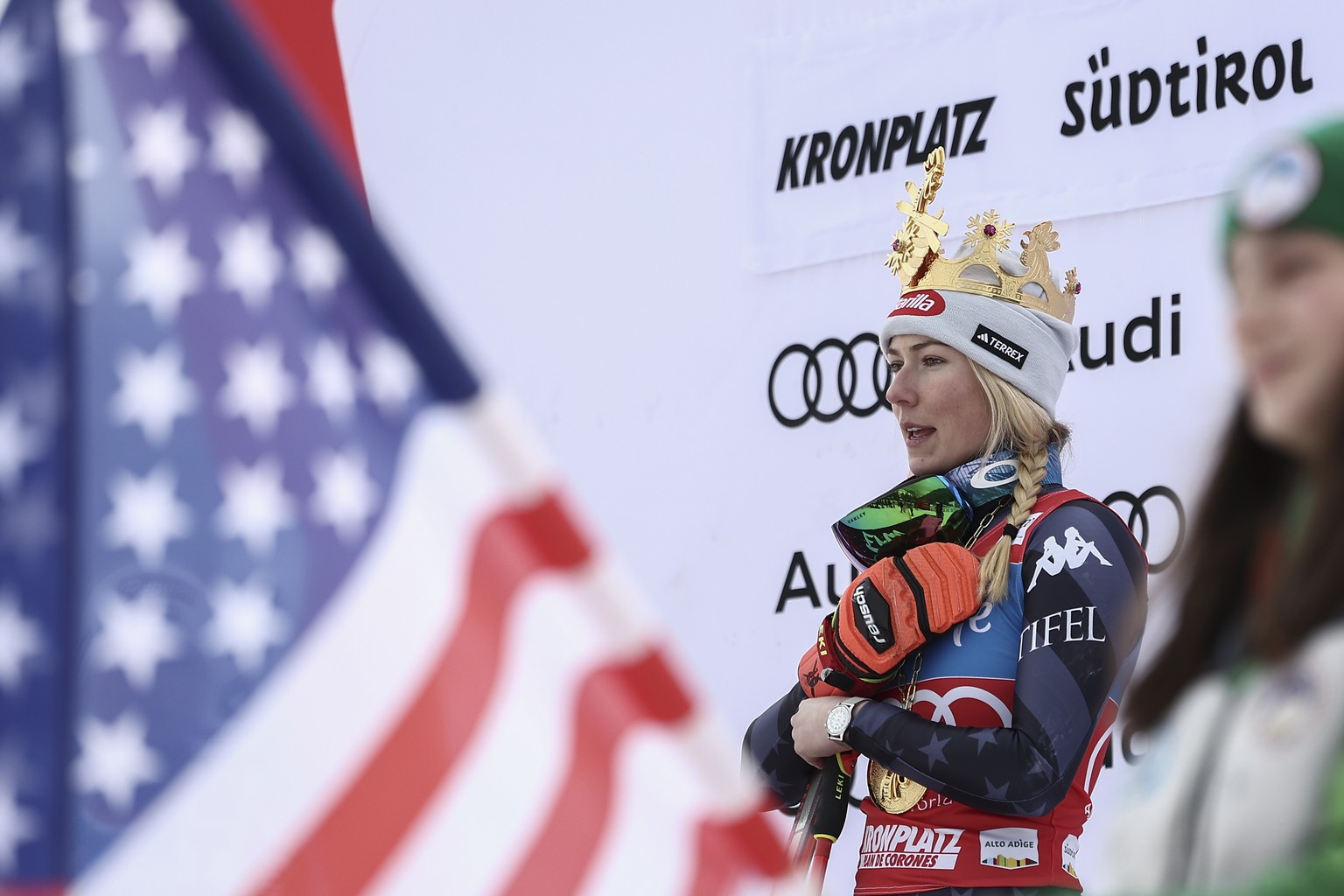 United States&#039; Mikaela Shiffrin sings the national anthem on the podium after winning an alpine ski, women&#039;s World Cup giant slalom, in Kronplatz, Italy, Tuesday, Jan. 24, 2023. Shiffrin won ...