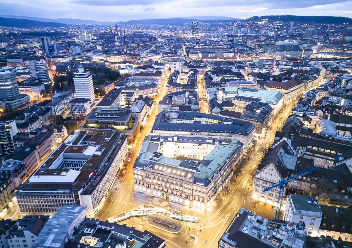 epa10532657 An aerial view shows the headquarters of the Swiss banks Credit Suisse (R) and UBS (L), at Paradeplatz in Zurich, Switzerland, 19 March 2023. The bank UBS takes over Credit Suisse for 2 bi ...