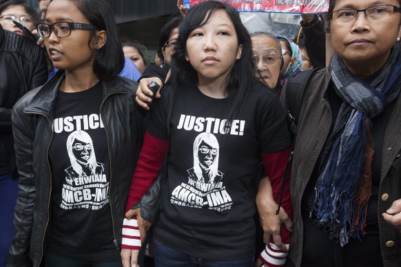 Erwiana Sulistyaningsih (Mitte) wurde misshandelt.