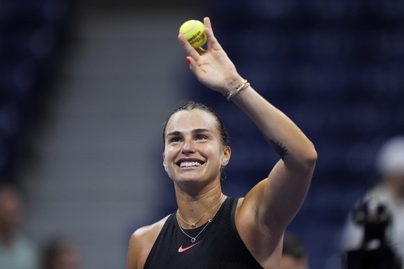 Aryna Sabalenka, of Belarus, reacts to winning a match against Erika Andreeva, of Russia, in the third round of the U.S. Open tennis championships Saturday, Aug. 31, 2024, in New York. (AP Photo/Julia ...