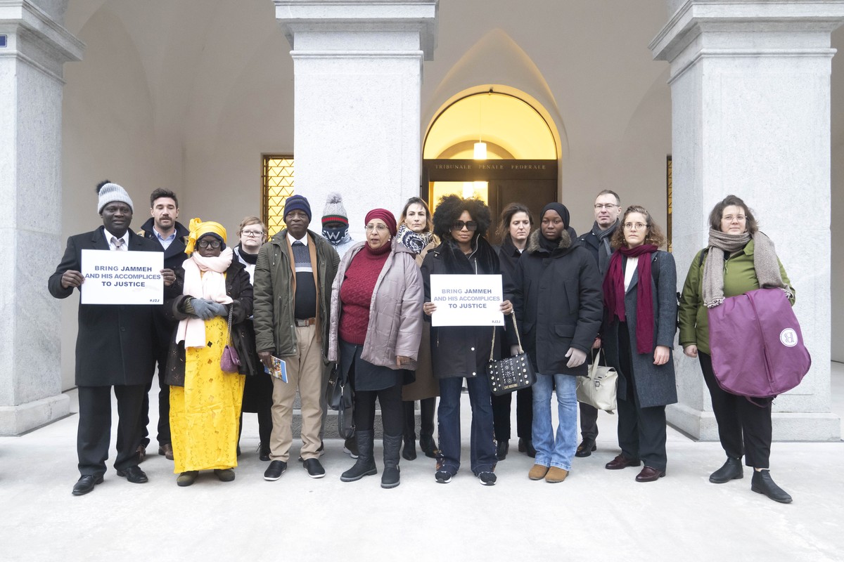 epa11064081 Victims and their relatives demonstrate in front of the Federal Criminal Court of Switzerland before the beginning of the trial against Gambia's former Interior Minister Ousman Sonko  ...
