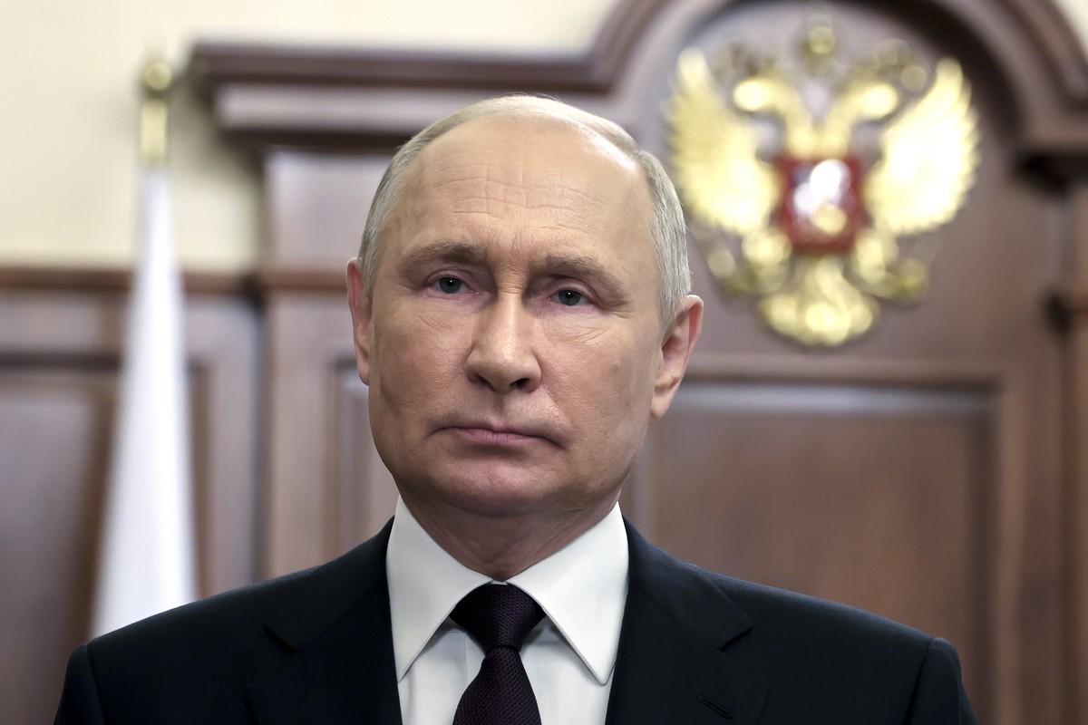 Russian President Vladimir Putin delivers a video address marking the Russia's National Flag Day at the Kremlin in Moscow, Russia, Tuesday, Aug. 22, 2023. (Mikhail Klimentyev, Sputnik, Kremlin Po ...