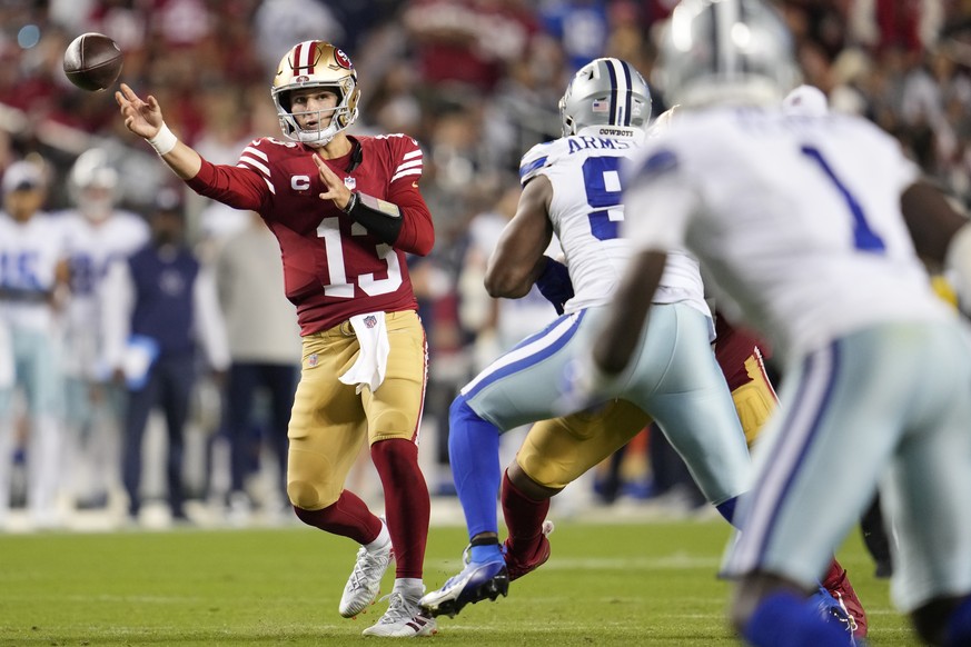 San Francisco 49ers quarterback Brock Purdy (13) passes against the Dallas Cowboys during the second half of an NFL football game in Santa Clara, Calif., Sunday, Oct. 8, 2023. (AP Photo/Godofredo A. V ...