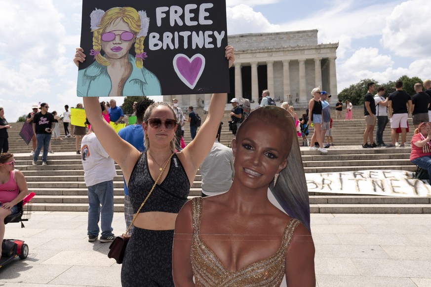 Maggie Howell supporter of pop star Britney Spears protests next to a Britney Spears cardboard cutout at the Lincoln Memorial, during the &quot;Free Britney&quot; rally, Wednesday, July 14, 2021, in W ...