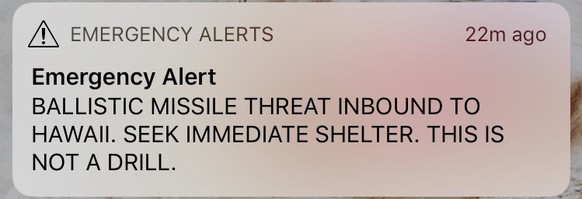 This smartphone screen capture shows a false incoming ballistic missile emergency alert sent from the Hawaii Emergency Management Agency system on Saturday, Jan. 13, 2018. (AP Photo/Marco Garcia)