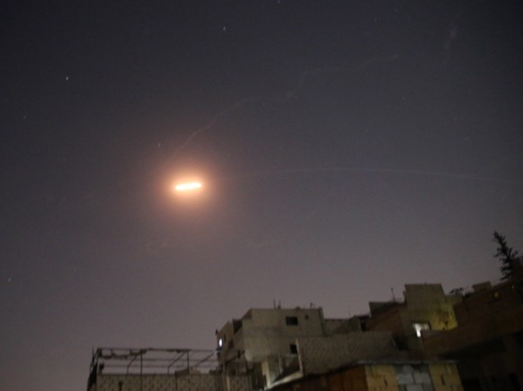 epa09421212 Syrian air defenses intercept missiles over Damascus, Syria, 19 August 2021. According to official Syrian media sources, Syrian air defenses intercepted missiles allegedly fired from Israe ...