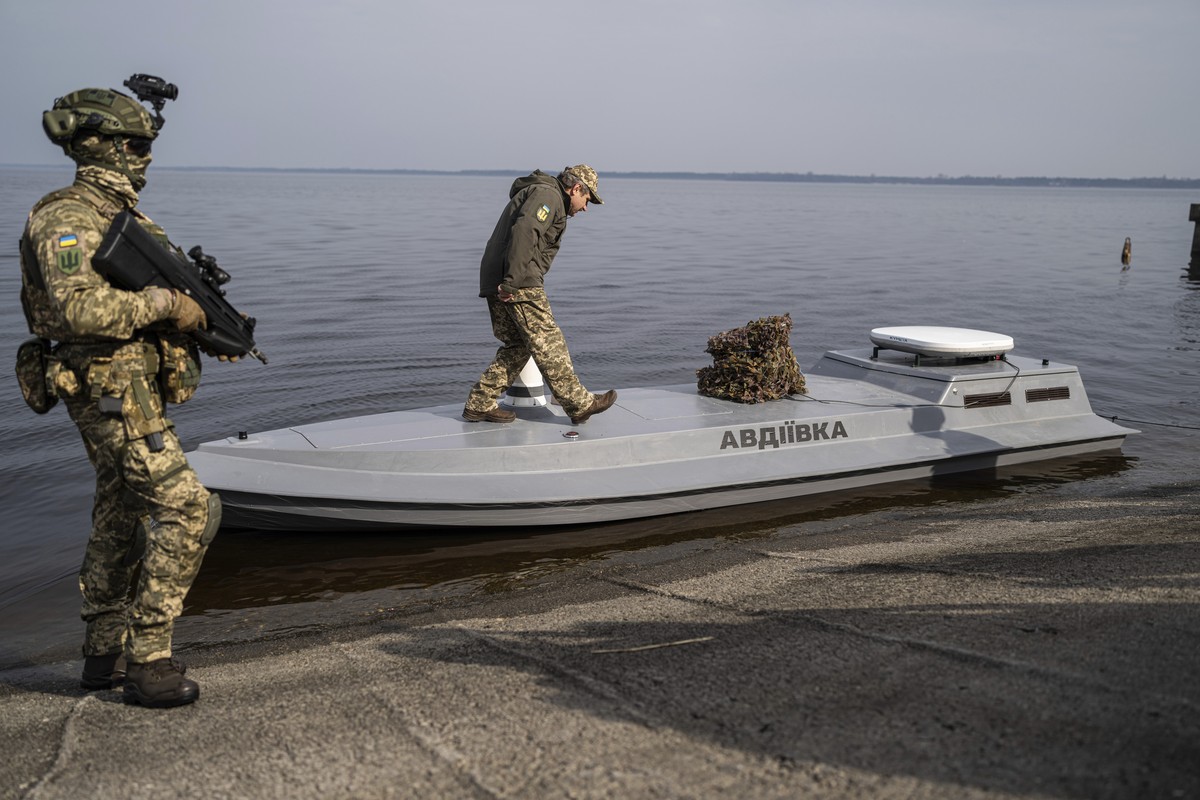 "Hunter, "a brigadier general from Ukraine's Military Counter-Intelligence walks on a new released Sea Baby drone "Avdiivka" during the presentation by Ukraine's Security ...