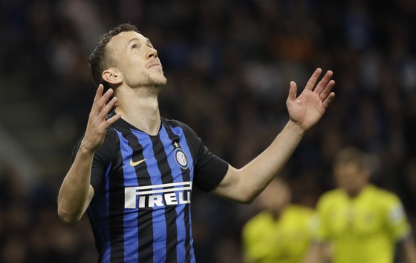 Inter Milan&#039;s Ivan Perisic gestures during a Serie A soccer match between Inter Milan and Chievo, at the San Siro stadium in Milan, Italy, Monday, May 13, 2019. (AP Photo/Luca Bruno)