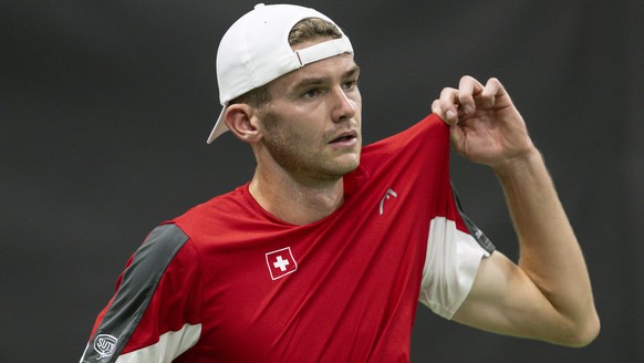Switzerland&#039;s Jerome Kym reacts to India&#039;s Dhakshineswar Suresh during the first match of the Davis Cup World Group I round between Switzerland and India at the Swiss Tennis Arena in Biel, S ...