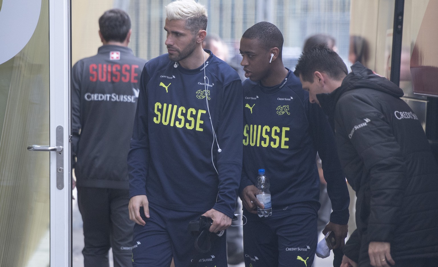 Swiss players Valon Behrami, left, and Gelson Fernandes, centre, before a training of the Swiss soccer national team, in Lucerne, Switzerland, Suday, 25 March, 2018. Switzerland will play against Pana ...