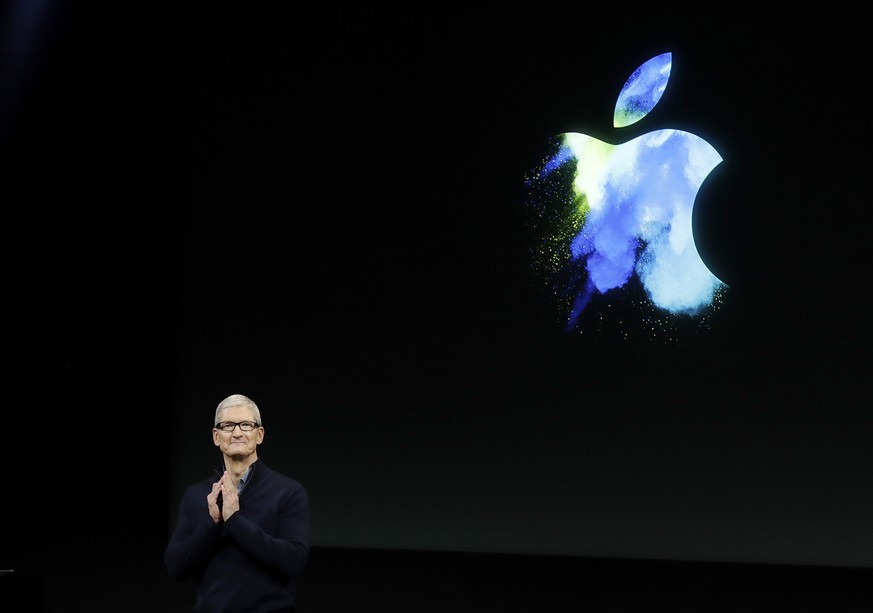 FILE- In this Oct. 27, 2016, file photo, Apple CEO Tim Cook speaks during an announcement of new products in Cupertino, Calif. Apple will invest $1 billion to help create more U.S. manufacturing jobs  ...