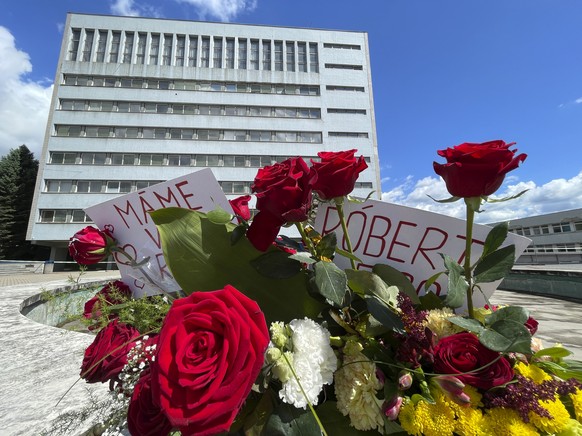 Flowers are placed outside the F. D. Roosevelt University Hospital, where Slovak Prime Minister Robert Fico, who was shot and injured, is being treated, in Banska Bystrica, central Slovakia, Saturday, ...