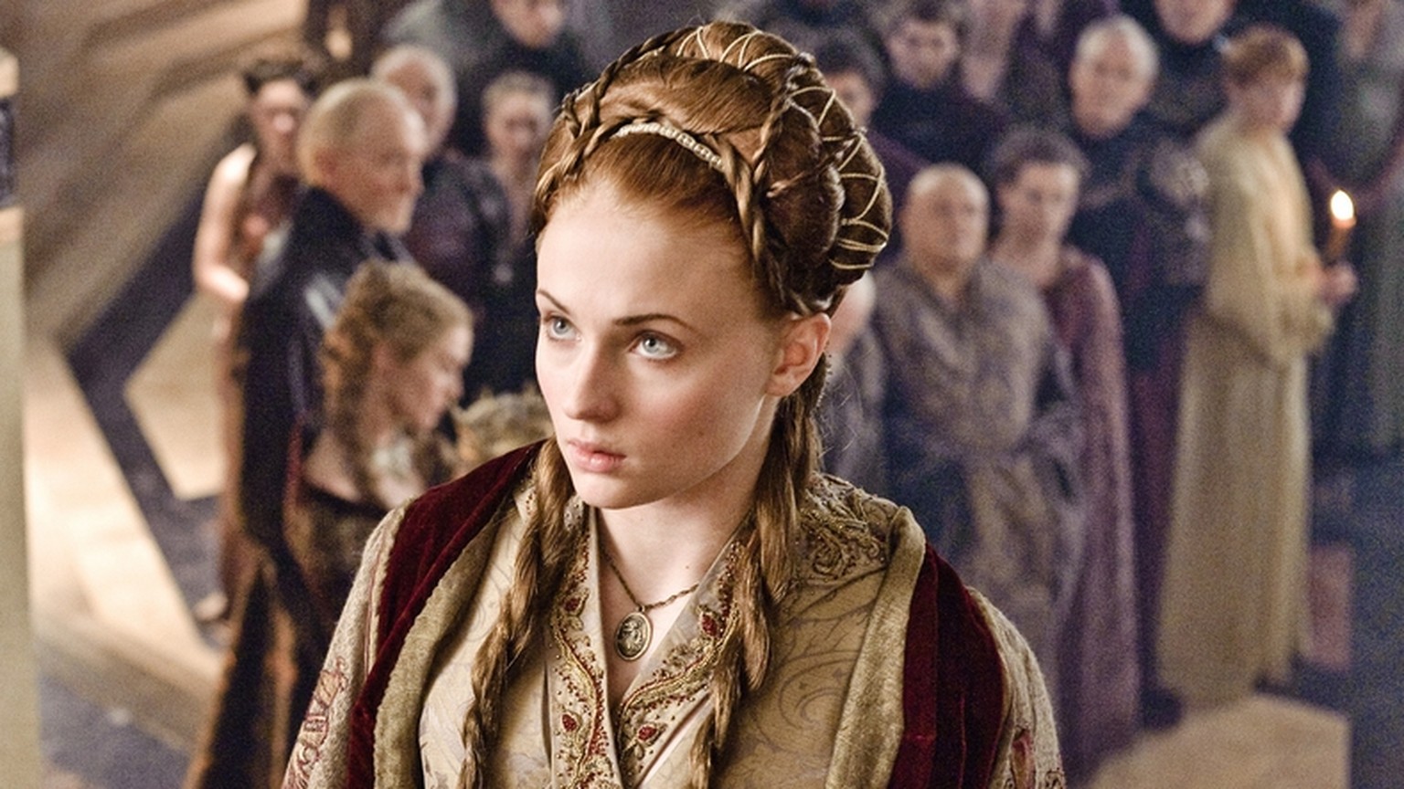This publicity image released by HBO shows Peter Dinklage, left, and Sophie Turner in a scene from "Game of Thrones." The program was nominated for an Emmy Award for Outstanding Drama Series...