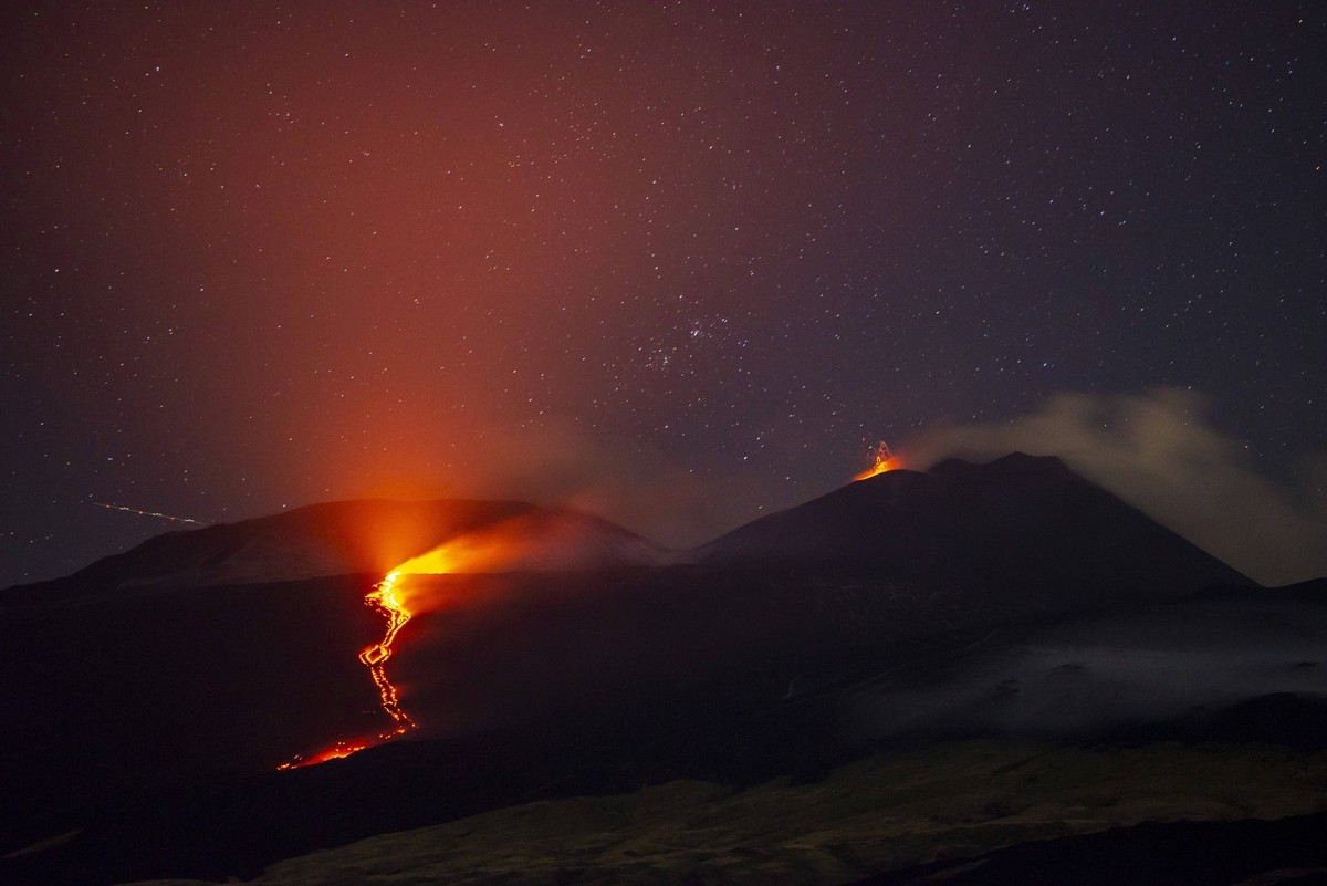 Lava Flows During Mount Etna Eruption CATANIA, ITALY - AUGUST 16: Lava flows down the slope of Mount Etna during the eruption in Catania, Italy, on August 16, 2025. The lava is fed by an effusive frac ...