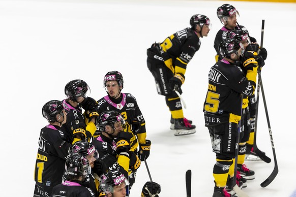 Ajoie&#039;s players look disappointed after losing against Geneve-Servette, during a National League regular season game of the Swiss Championship between Geneve-Servette HC, GSHC, and HC Ajoie, HCA, ...