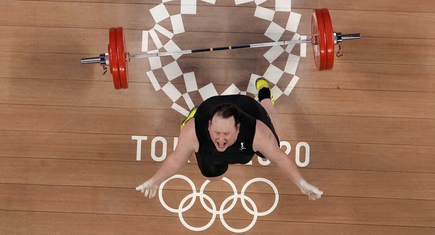 Laurel Hubbard of New Zealand drops the barbell during a lift, in the women&#039;s +87kg weightlifting event at the 2020 Summer Olympics, Monday, Aug. 2, 2021, in Tokyo, Japan. (AP Photo/Luca Bruno)