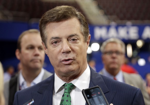 FILE - In this July 17, 2016 file photo, then-Donald Trump campaign chairman Paul Manafort talks to reporters on the floor of the Republican National Convention, in Cleveland. Manafort, President Dona ...