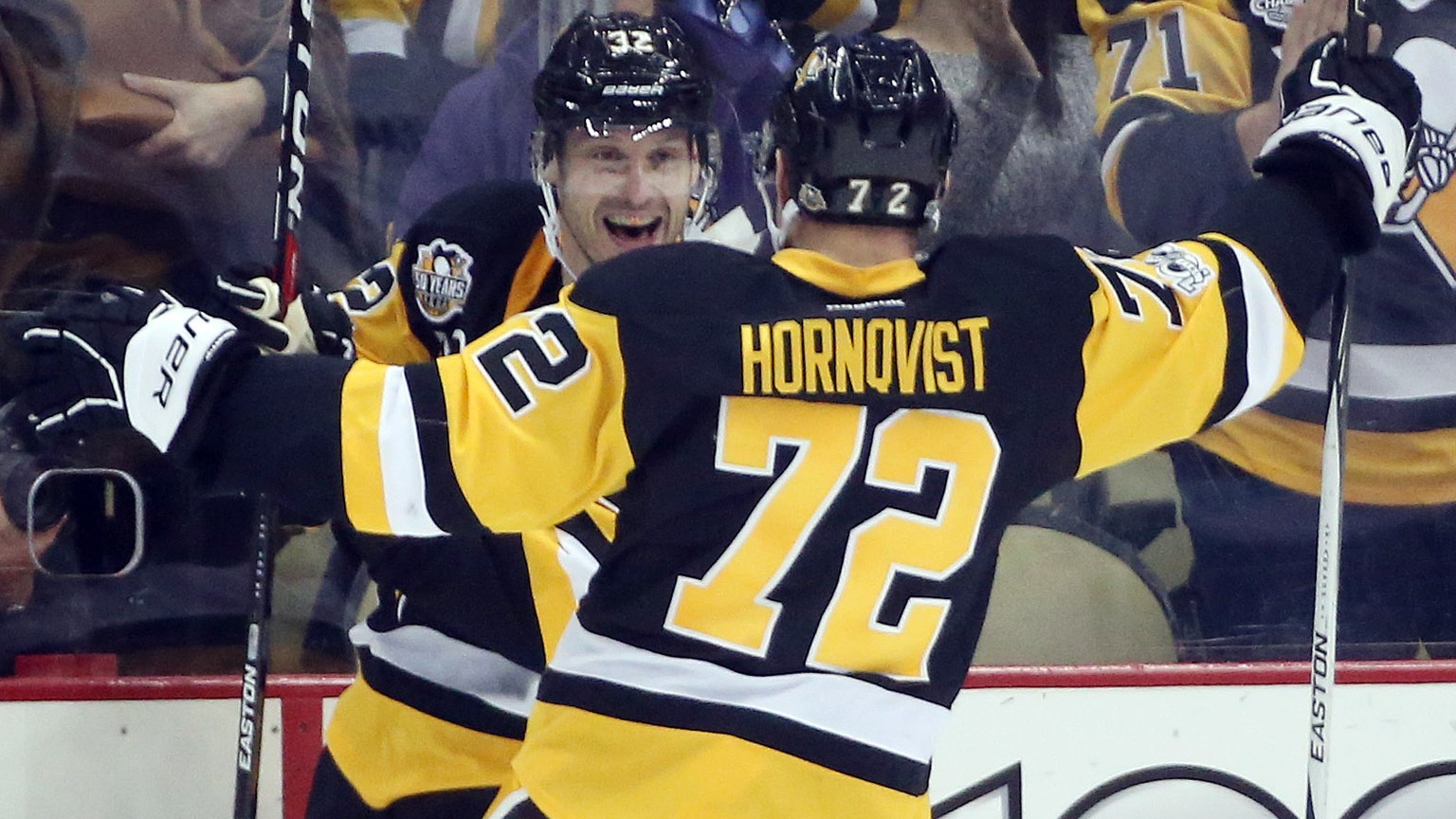 Mar 3, 2017; Pittsburgh, PA, USA; Pittsburgh Penguins defenseman Mark Streit (L) celebrates his goal with right wing Patric Hornqvist (72) against the Tampa Bay Lightning during the third period at th ...