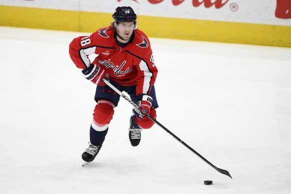 Washington Capitals defenseman Rasmus Sandin (38) skates with the puck during the third period of an NHL hockey game against the Florida Panthers, Saturday, April 8, 2023, in Washington. (AP Photo/Nic ...