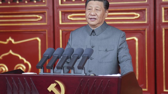 In this photo provided by China&#039;s Xinhua News Agency, Chinese President and party leader Xi Jinping delivers a speech at a ceremony marking the centenary of the ruling Communist Party in Beijing, ...