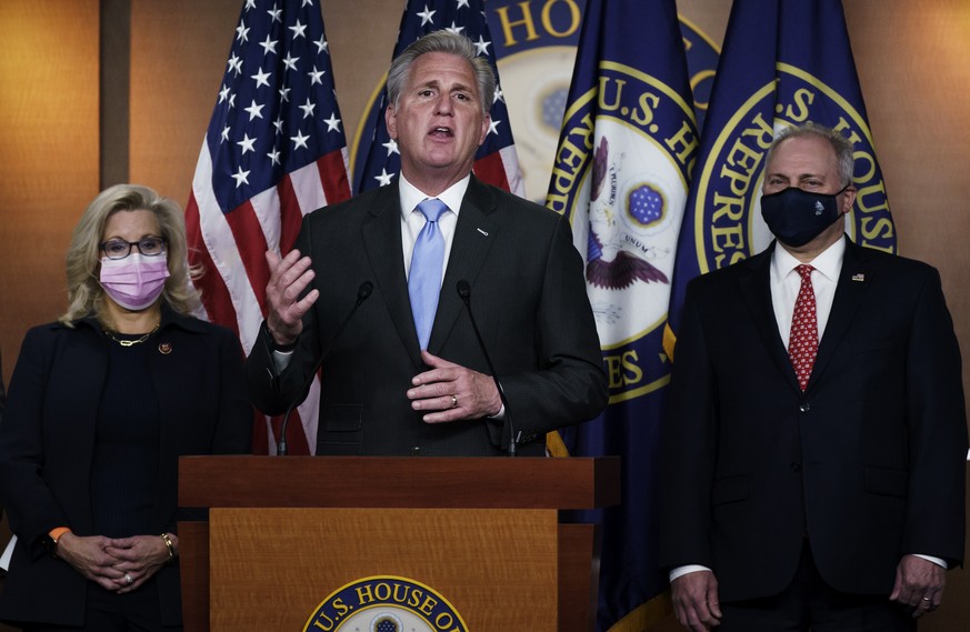 House Minority Leader Kevin McCarthy, R-Calif., center, flanked by GOP Conference chair Rep. Liz Cheney, R-Wyo., left, and House Minority Whip Steve Scalise, R-La., right, speaks to reporters followin ...