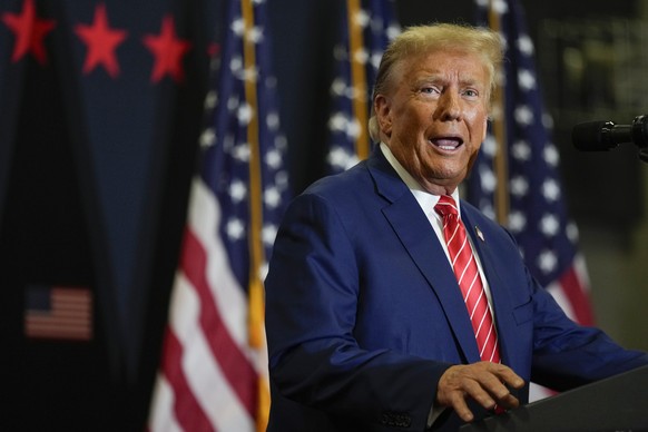 Republican presidential candidate former President Donald Trump speaks during a commit to caucus rally, Saturday, Jan. 6, 2024, in Clinton, Iowa. (AP Photo/Charlie Neibergall)
Donald Trump