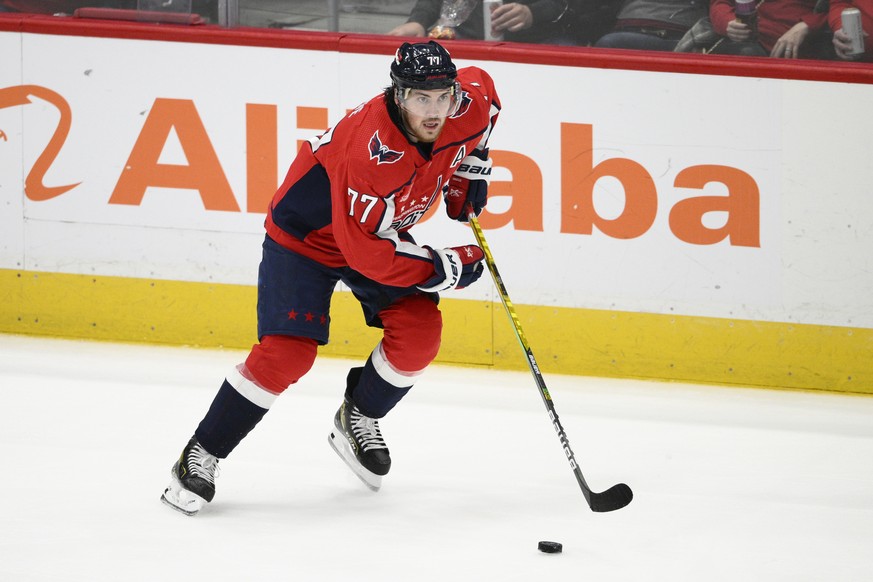 Washington Capitals right wing T.J. Oshie (77) skates with the puck during the third period of an NHL hockey game against the Dallas Stars, Thursday, Dec. 15, 2022, in Washington. The Stars won 2-1. ( ...