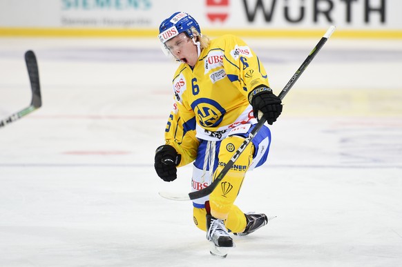 Davos`goalgetter Sam Lofquist celebrates after scoring 1:0 during the game between Team Canada and HC Davos at the 91th Spengler Cup ice hockey tournament in Davos, Switzerland, Thursday, December 28, ...