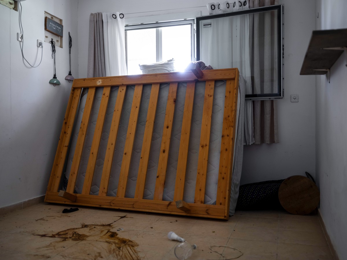Blood stains the floor of the bedroom where Ariel Cunio, 27 and his girlfriend, Arbel Yehud, 29, were kidnapped on Oct. 7, in Kibbutz Nir Oz, Israel, on Friday, June 21, 2024. (AP Photo/Oded Balilty)
