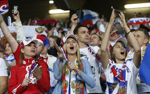 epa05366658 Russia supporters before the UEFA EURO 2016 group B preliminary round match between Russia and Slovakia at Stade Pierre Mauroy in Lille, France, 15 June 2016.

(RESTRICTIONS APPLY: For e ...