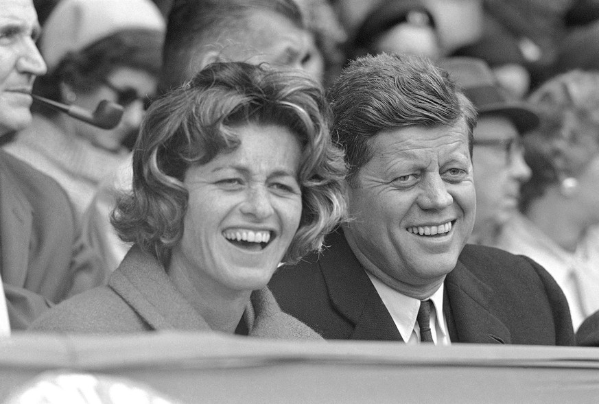 FILE - In this April 10, 1961, file photo, President John F. Kennedy and his sister, Jean Kennedy Smith, watch an opening day baseball game at Griffith Stadium in Washington. Smith, the youngest siste ...