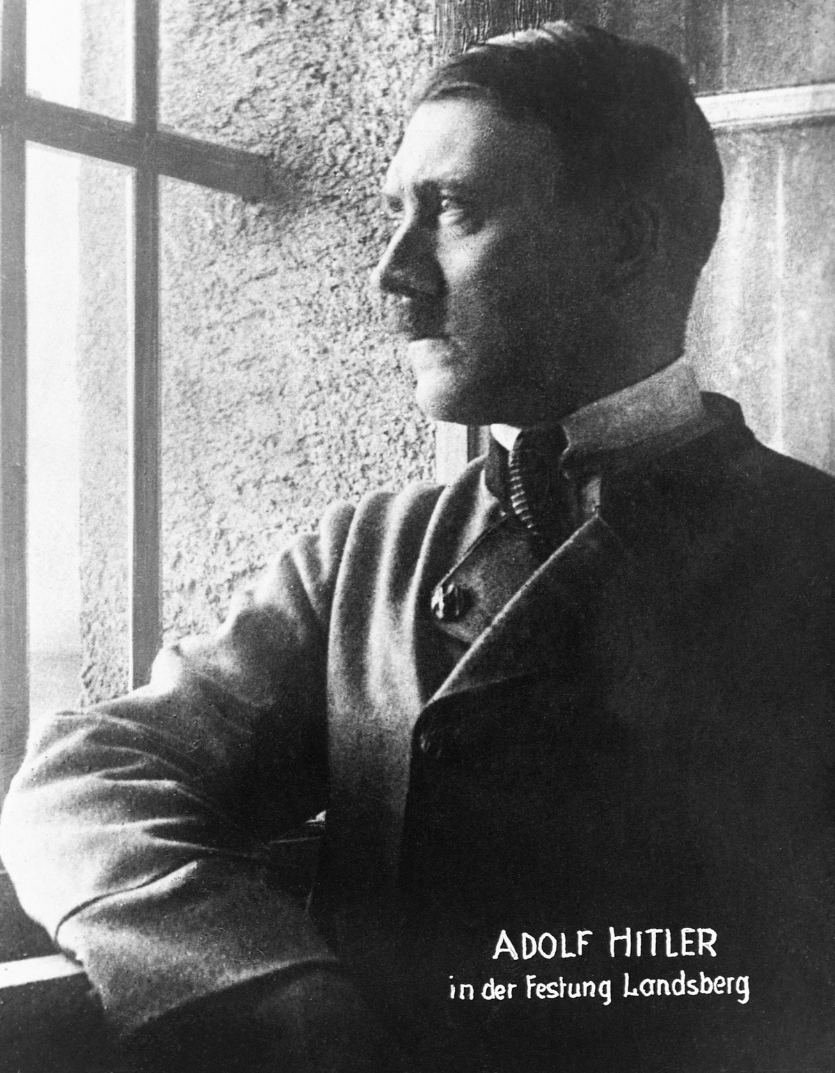 Adolf Hitler looks out a window in Landsberg am Lech prison in 1924. (Photo by © CORBIS/Corbis via Getty Images)