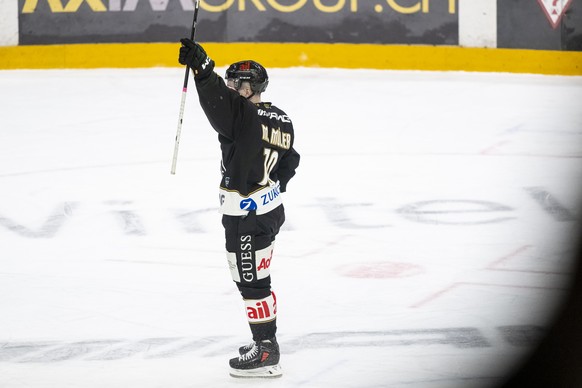 Marco Mueller (HCL), celebrate 3-2 goal, during the regular season of National League A (NLA) Swiss Championship 2024/25 between HC Lugano and EV Zug at the ice stadium Corner Arena, Switzerland, Frid ...