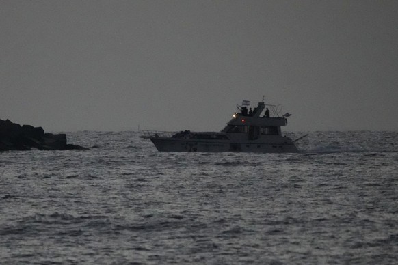 Israeli naval forces sail a confiscated Gaza-bound flotilla boat into Israel's Ashdod port after intercepting the vessel on the Mediterranean Sea, Tuesday, May 19, 2026. (AP Photo/Ariel Schalit)
 ...