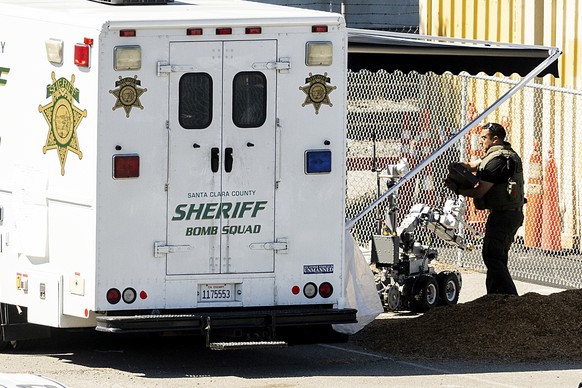 An emergency responder stows a bomb squad robot following a shooting at a Santa Clara Valley Transportation Authority (VTA) rail yard on Wednesday, May 26, 2021, in San Jose, Calif. A Santa Clara Coun ...