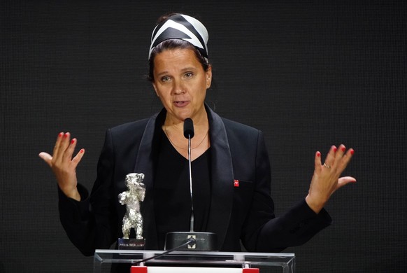 epa09268988 Director Maria Speth, winner of the International silver jury award for the movie &#039;Herr Bachmann und seine Klasse&#039;, addrtesses the participants after receiving her trophy during  ...