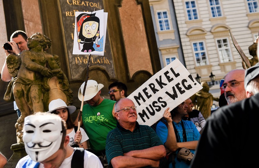 Angela Merkel gegen die dreckigen Vier