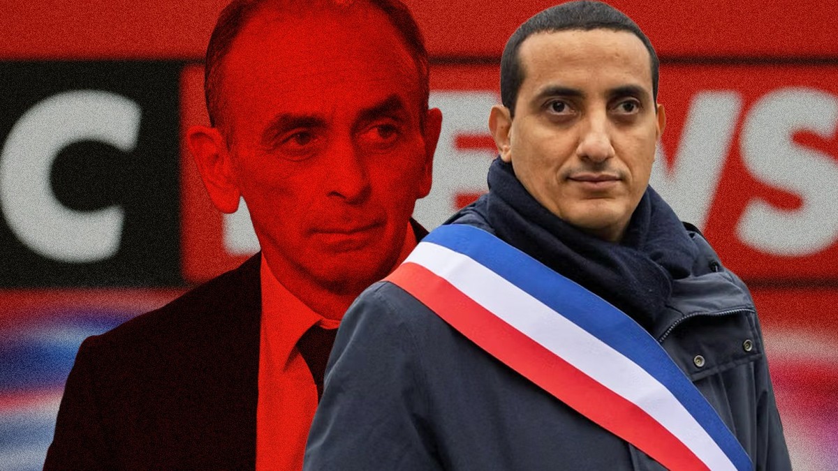 Le maire de Trappes Ali Rabeh au premier plan. Derrière lui, Eric Zemmour, candidat à l'élection présidentielle française.