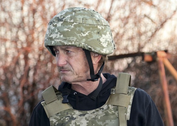 Hollywood actor and producer Sean Penn visits positions of the Ukrainian Armed Forces near the frontline with Russia-backed separatists in Donetsk region, Ukraine, Thursday, Nov. 18, 2021. Sean Penn c ...