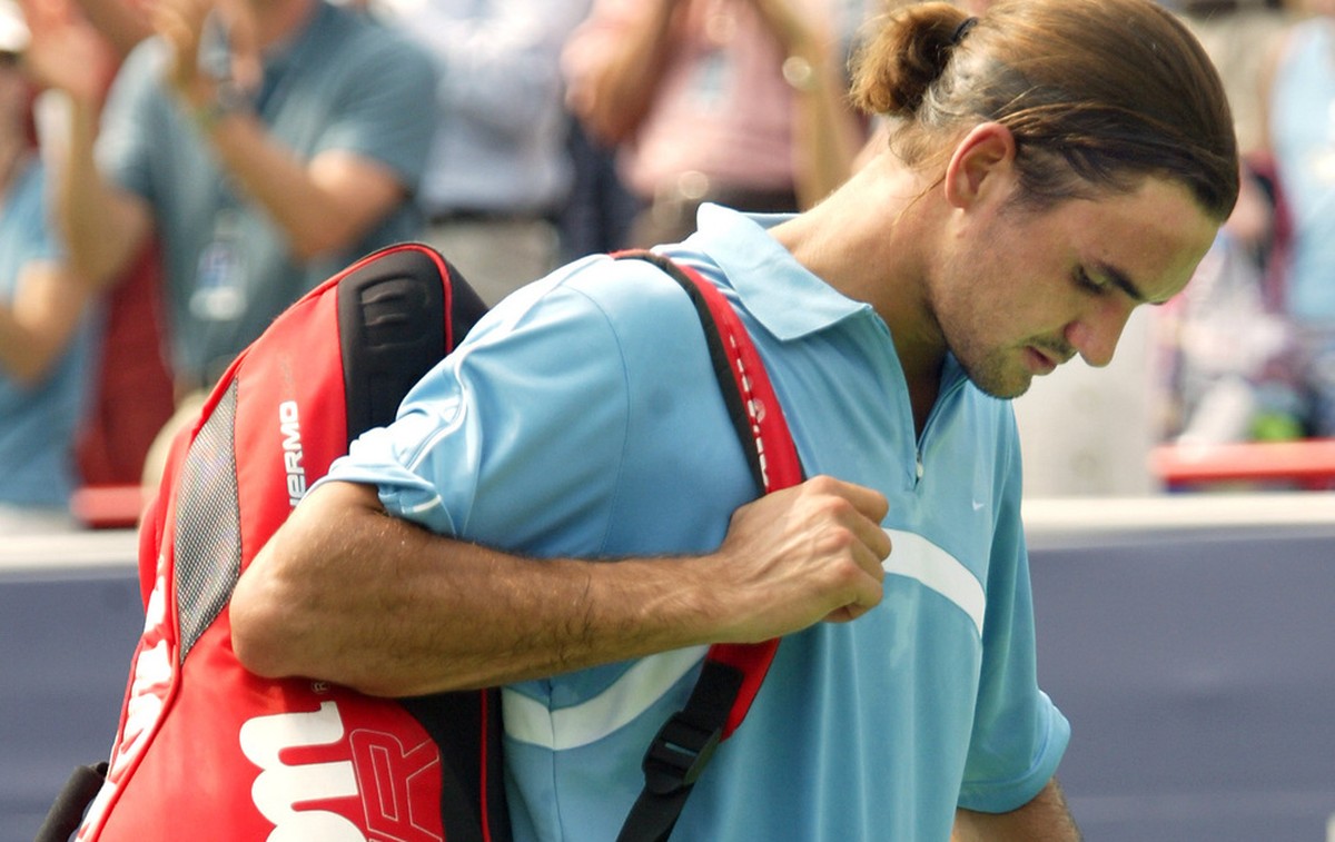 Roger Federer of Switzerland walks off the court following his loss to Andy Roddick of the US during the semifinals at the Tennis Masters Canada Series Saturday, August 9, 2003 in Montreal. Roddick be ...