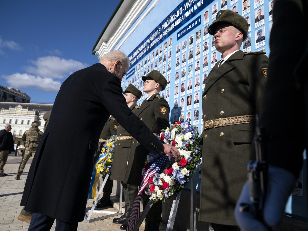 US President Joe Biden participates in a wreath laying ceremony with Ukrainian President Volodymyr Zelenskyy at the memorial wall outside of St. Michael's Golden-Domed Cathedral during an unannou ...