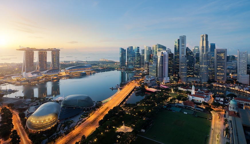 Aerial view of Singapore business district and city at twilight in Singapore, Asia