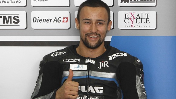 Moto2 rider Randy Krummenacher of Switzerland shows a thumbs up before the third free practice session ahead of Sunday&#039;s Malaysian Motorcycle Grand Prix in Sepang, Malaysia, Saturday, Oct. 24, 20 ...