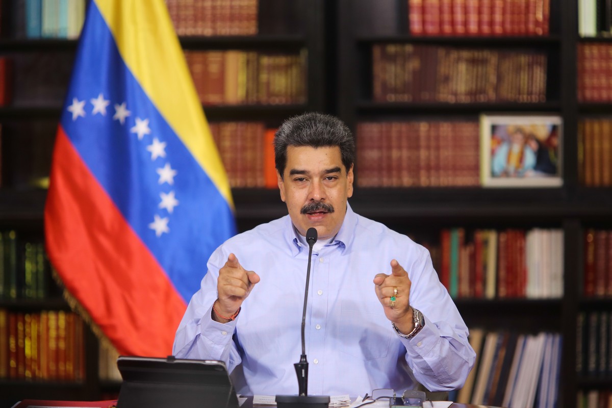 epa08721350 A handout photo made available by the Miraflores press office showing the President of Venezuela Nicolas Maduro during a presser in Caracas, Venezuela, 04 October 2020. EPA/Miraflores pres ...