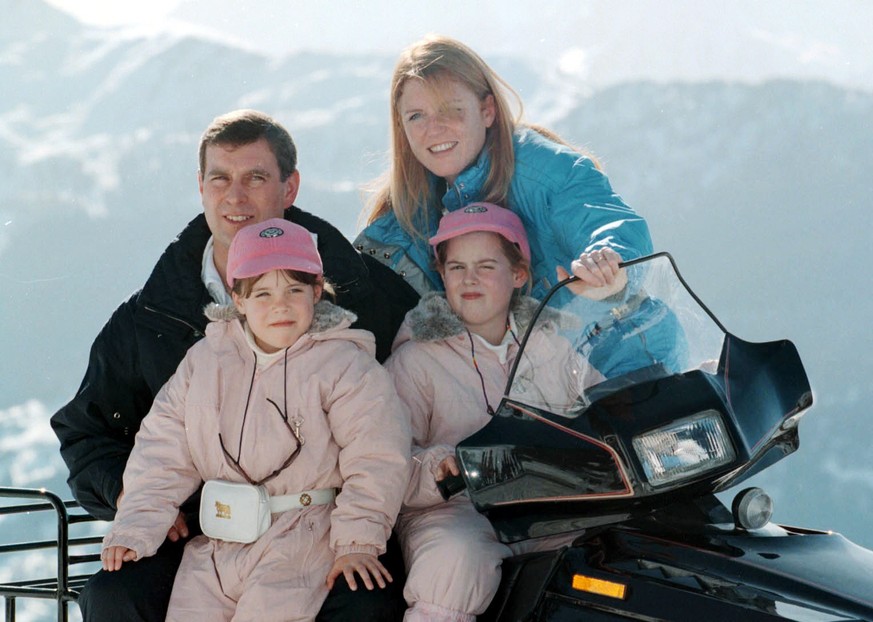 The Duchess of York with former husband the Duke of York, during a photocall with their daughters Princesses Beatrice (right), nine, and seven-year-old Eugenie in Verbier, Switzerland today (Thursday) ...