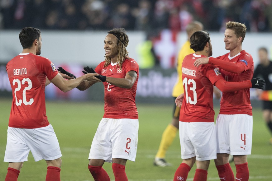 epa07175994 Switzerland&#039;s Loris Benito, Switzerland&#039;s Kevin Mbabu, Switzerland&#039;s Ricardo Rodriguez and Switzerland&#039;s Nico Elvedi, from left, celebrate their victory during the UEFA ...