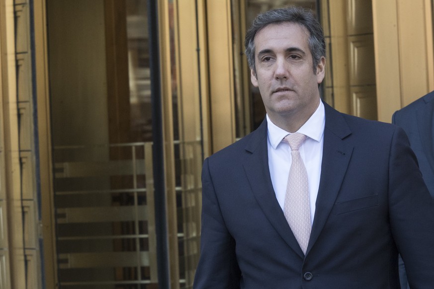 FILE - In this April 26, 2018 file photo, Michael Cohen, President Donald Trump&#039;s personal attorney, leaves federal court in New York. Cohen wants a federal judge to stop the lawyer for porn actr ...