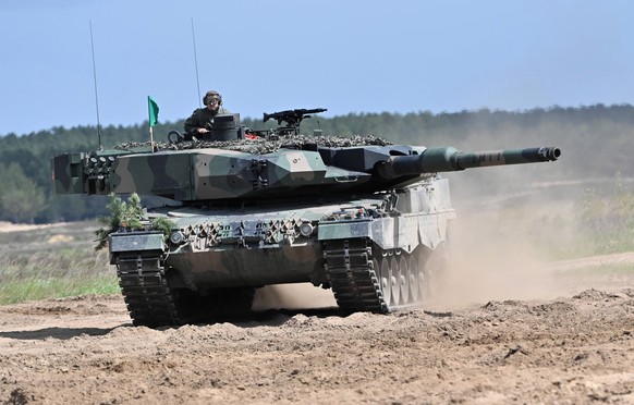 epa10424673 (FILE) - A &#039;Leopard 2PL&#039; tank of the Polish army during the international exercise pk. DefenderEurope2022 at firing range Drawsko Pomorskie, northwest Poland, 27 May 2022 (reissu ...