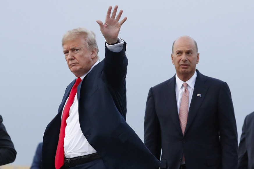 FILE - In this July 10, 2018, file photo, President Donald Trump is joined by Gordon Sondland, the U.S. ambassador to the European Union, second from right, as he arrives at Melsbroek Air Base, in Bru ...